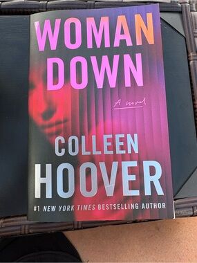 'Woman Down' Paperback Novel - Pink/Red Cover